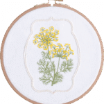 Dill flower embroidery kit with floral hand embroidery design in a wooden hoop