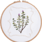 Lavender embroidery kit with purple botanical hand embroidery design in a wooden hoop