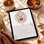 Autumn embroidery patterns: tablet showing the Autumn Harvest Stitch & Color Guide PDF cover, next to a cup of tea